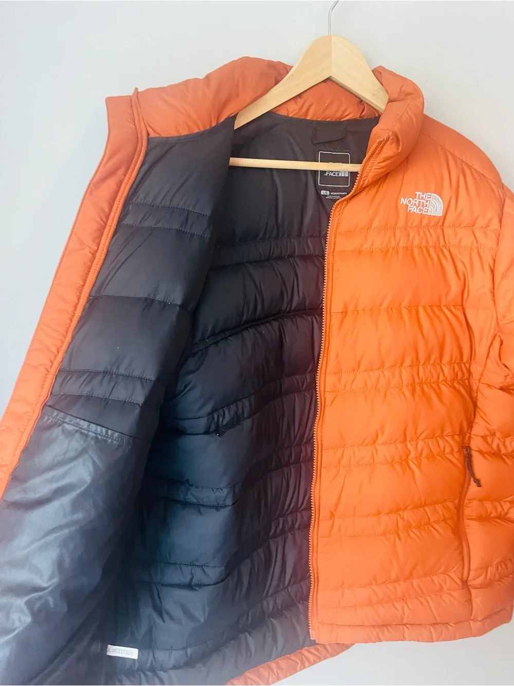 The North Face 550 Orange Rust Puffer Jacket